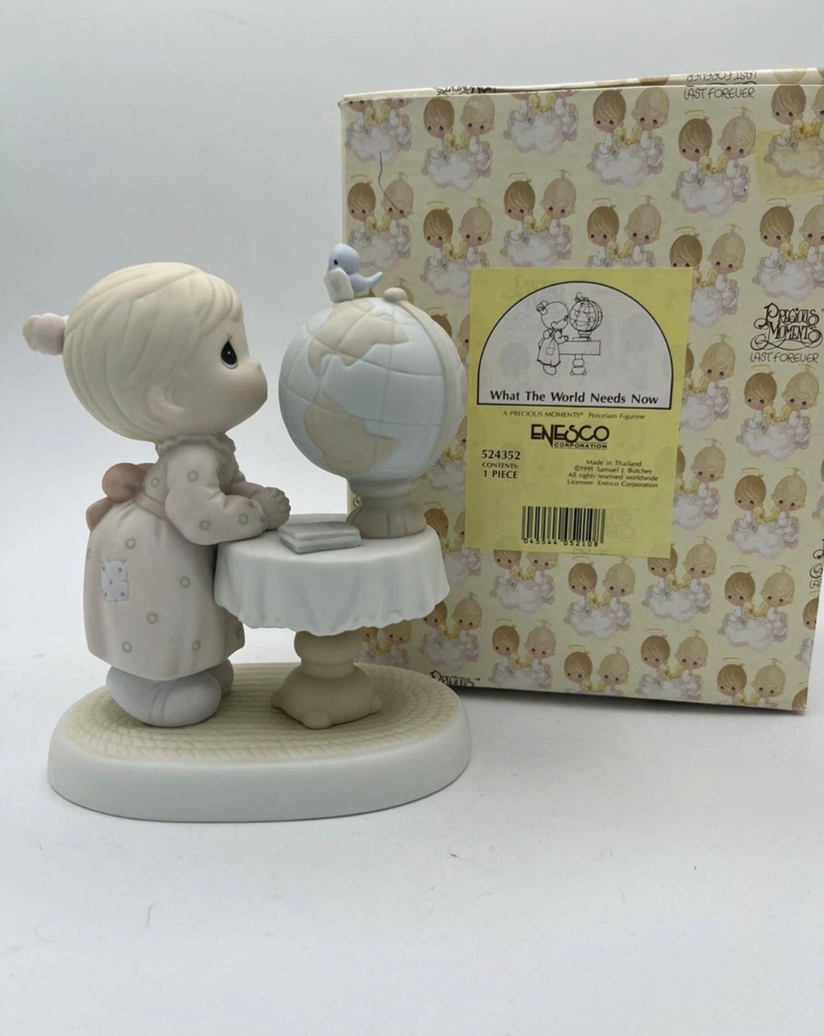 What The World Needs Now - Precious Moment Figurine