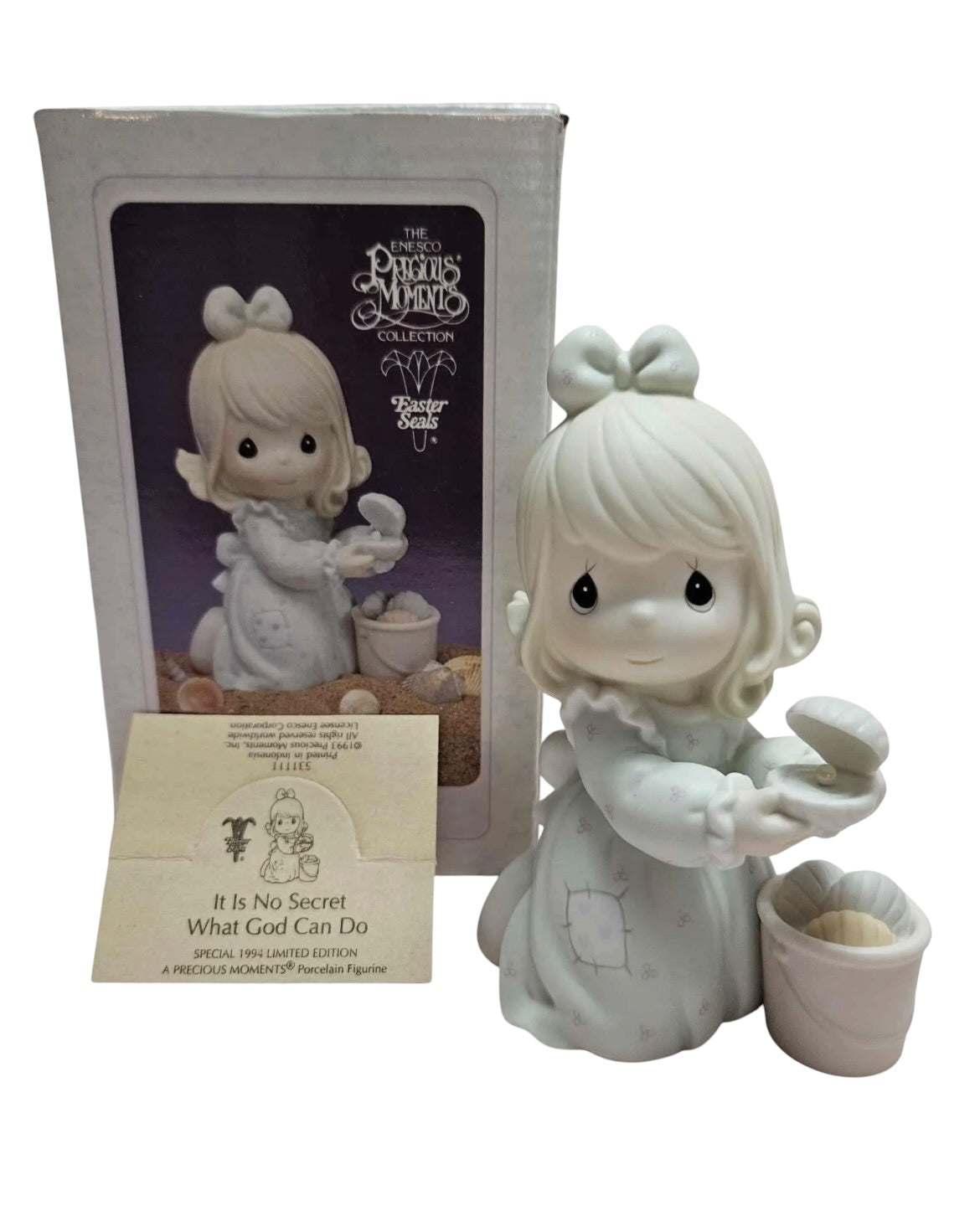 It's No Secret What God's Love Can Do - Precious Moment Figurine