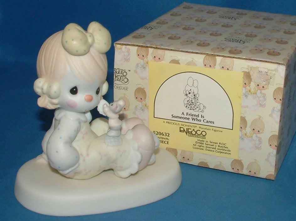 A Friend Is Someone Who Cares - Precious Moment Figurine