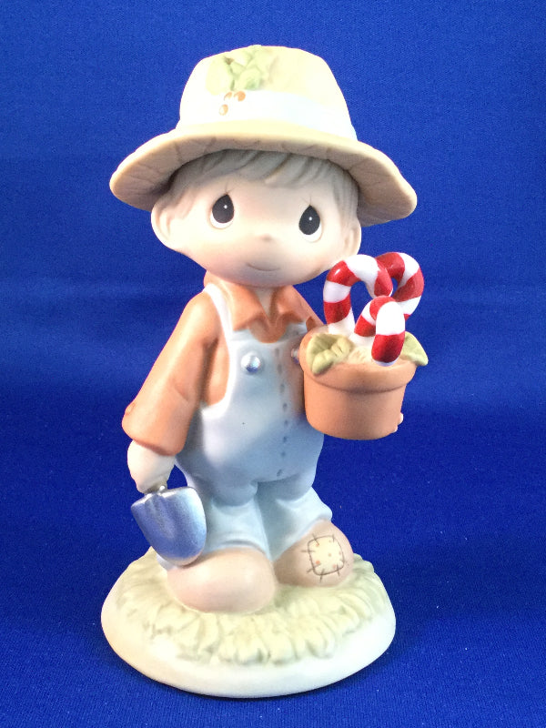 Raisin’ Cane On The Holidays - Precious Moment Figurine