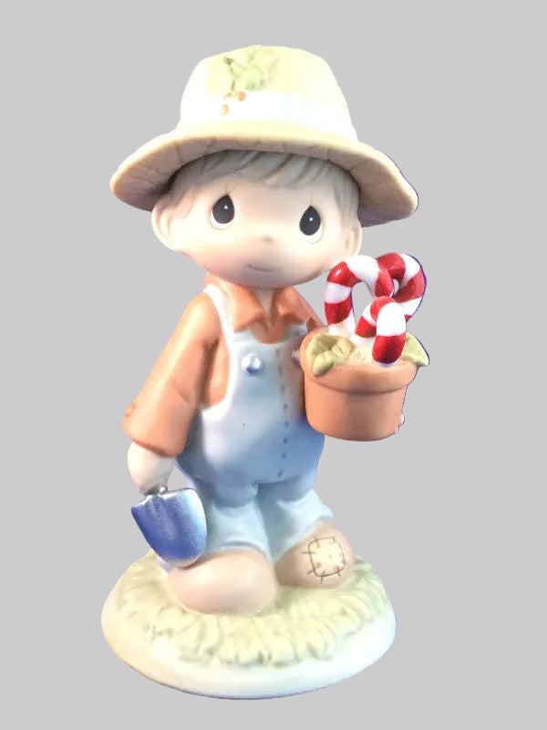 Raisin’ Cane On The Holidays - Precious Moment Figurine