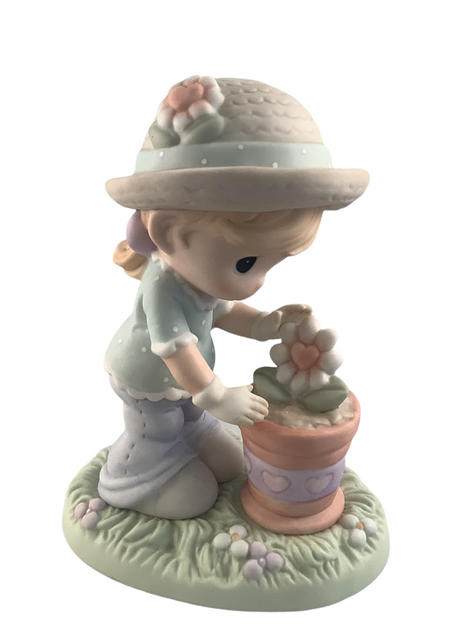 A Tender Touch Helps Love Bloom - Precious Moment Figurine