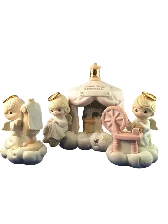 The Golden Town Seamstress  - Precious Moment Figurine