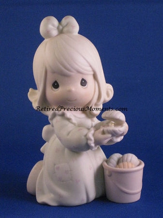 It's No Secret What God's Love Can Do - Precious Moment Figurine
