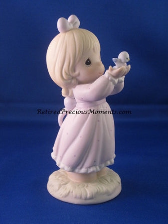 Sharing A Gift Of Love - Precious Moment Figurine